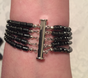 A five-strand bracelet made of hematite beads.