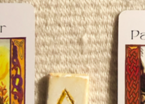 A teaser screenshot of this week’s Insight from the Oracles, with just a hint of the cards and runes showing.