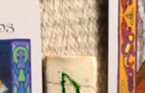 A teaser screenshot of the Monthly Overview spread, with just a hint of the cards and runes showing.