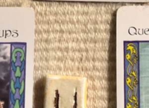 A teaser screenshot of this week’s Insight from the Oracles, with just a hint of the cards and runes showing.