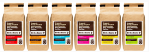 A photo of six bags of Birds & Bean coffee in different flavors.