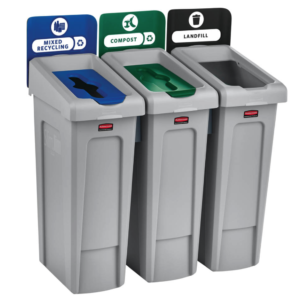 A photo of three grey waste bins, one with a blue "Recycling" label, one with a green "Compost" label, and one with a black "Landfill" label.