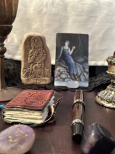 A small plaster tablet with an image of the Goddess Saga.